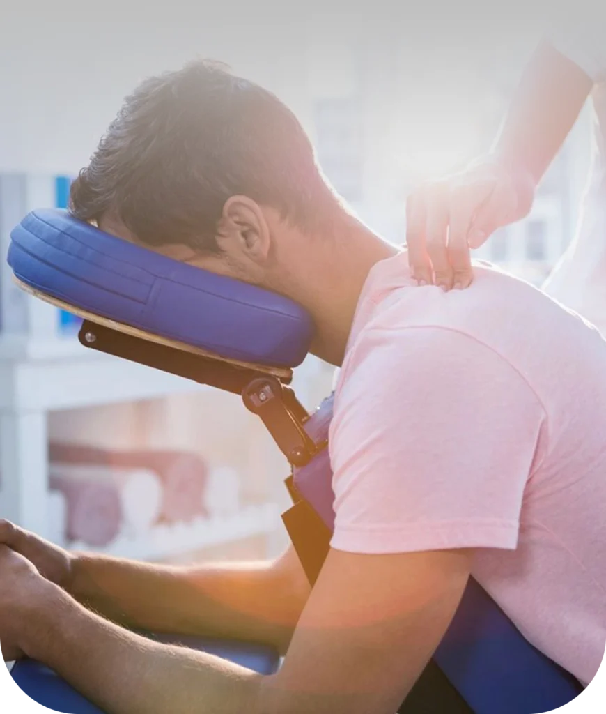 A man is getting his neck looked at by a softwave specialist in long island